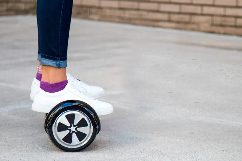 Girl riding Gotrax Hoverfly ECO