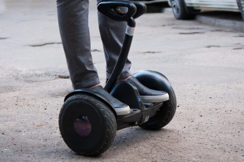 Guy riding a gyroboard