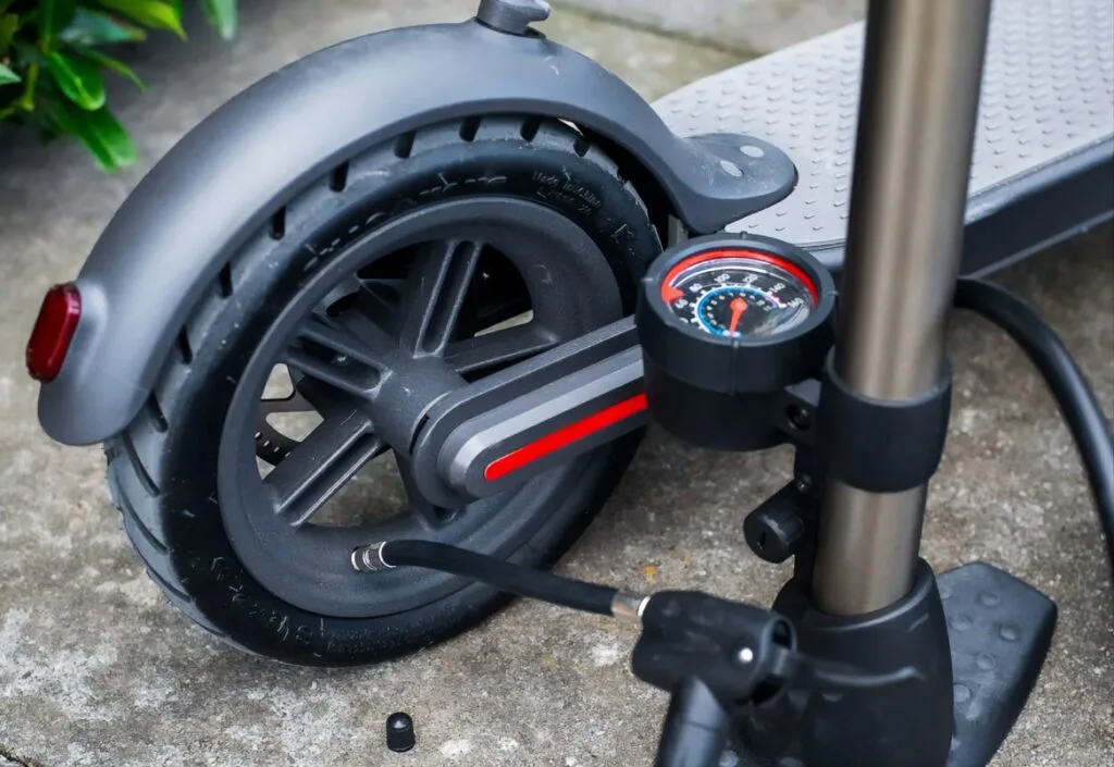 electric scooter tires getting pumped up
