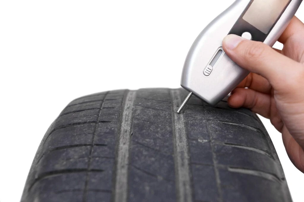 low tire tread check with a digital tread depth tool