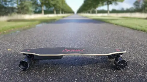 Lycaon GR 2021 electric skateboard with a scenic background