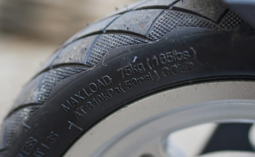 Electric scooter tire PSI instructions closeup