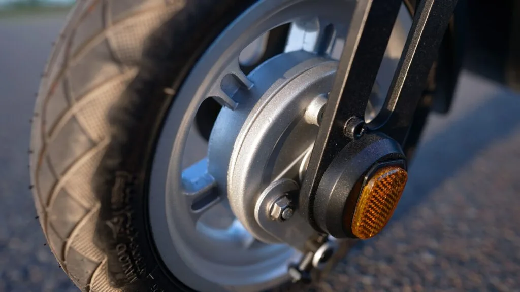 Close-up of the front drum brake on the Atomi Alpha