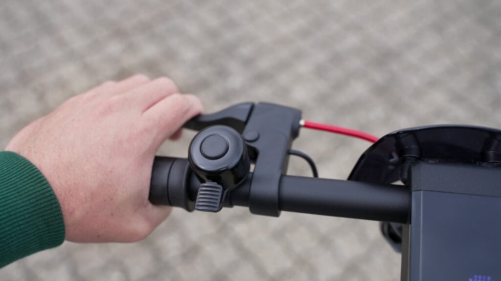 Pressing the left brake lever on the NIU KQi3 Max