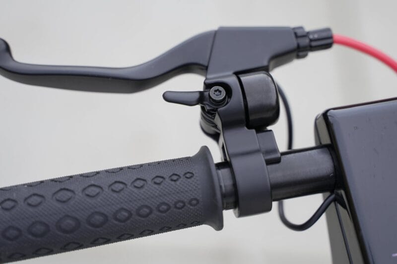 Closeup of brake lever and mechanical bell on turboant x7 max e scooter