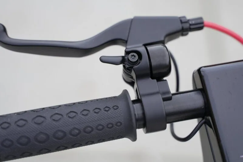 Closeup of brake lever and mechanical bell on turboant x7 max e scooter