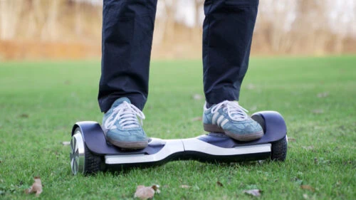 Riding a hoverboard on grass