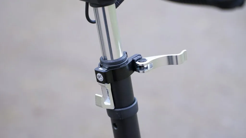 Close-up of the adjustable handlebar height mechanism on the Fluid Mosquito
