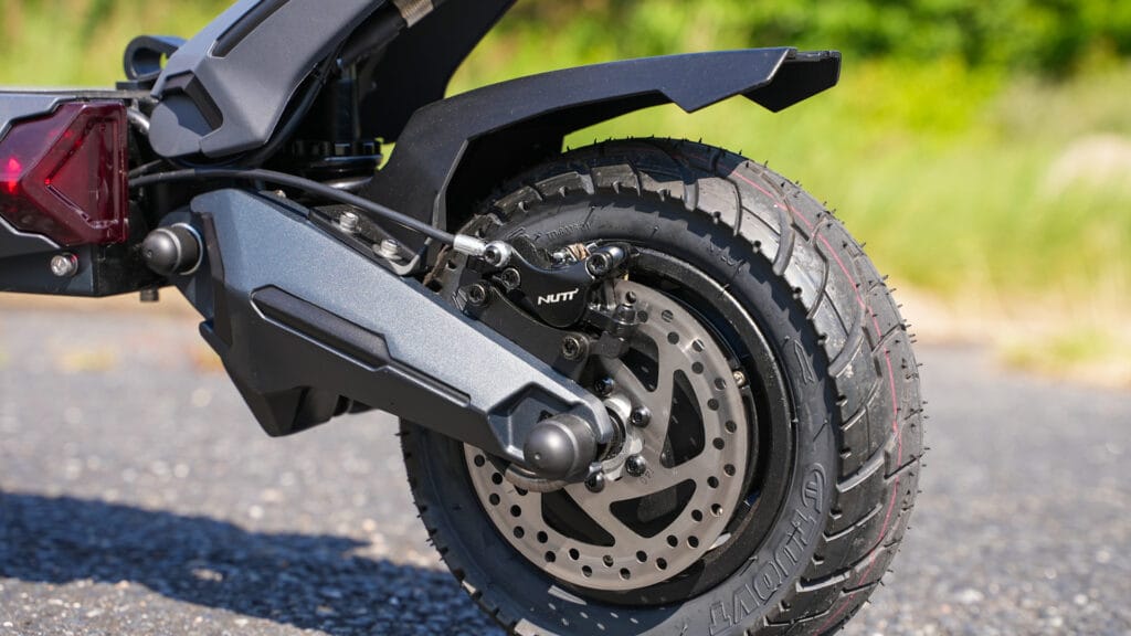 Rear wheel with disc brake and motor in focus on the Nanrobot N6 72V
