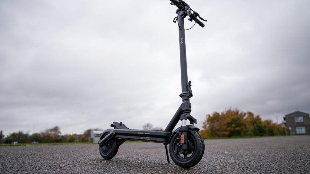 VMAX VX2 Lite electric scooter standing upright, low-angle front three-quarter view