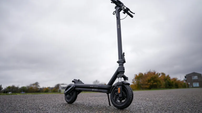 VMAX VX2 Lite electric scooter standing upright, low-angle front three-quarter view