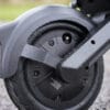 Close-up of the VMAX VX2 Lite rear hub motor, swingarm and rear light