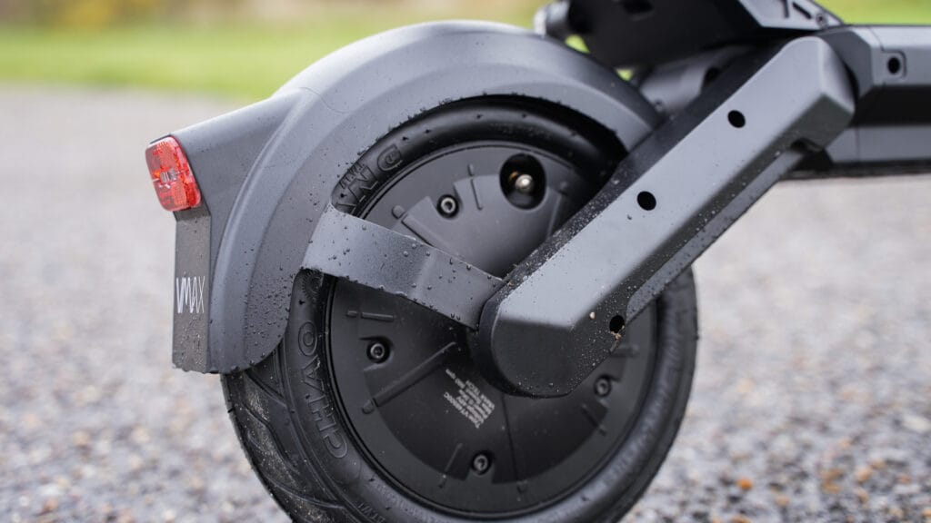 Close-up of the VMAX VX2 Lite rear hub motor, swingarm and rear light